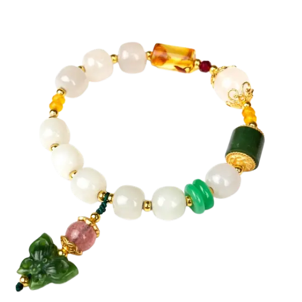 Vòng tay ngọc hòa điền phối hổ phách trụ mix bạc